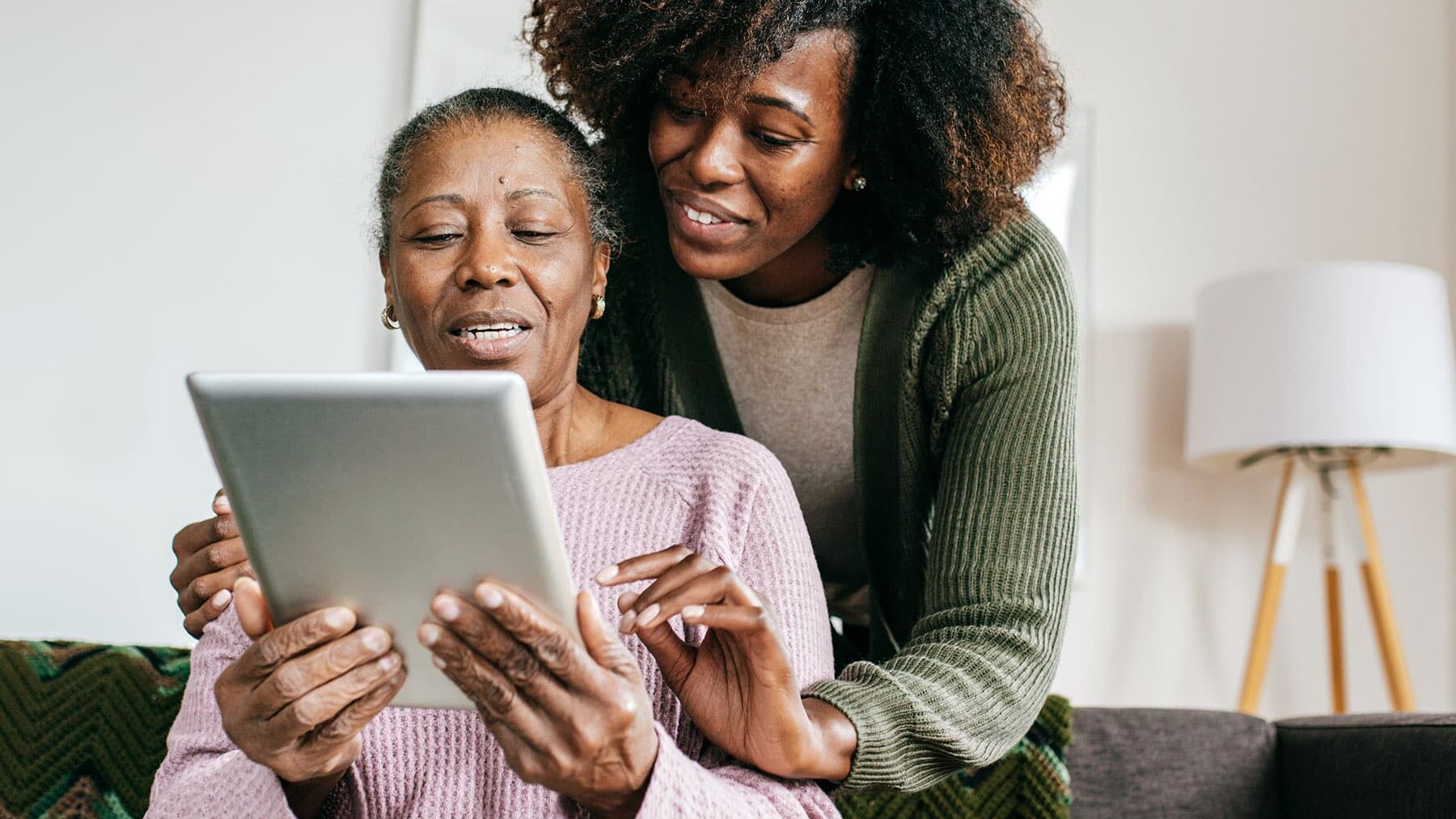 female caregiver discusses information with family member